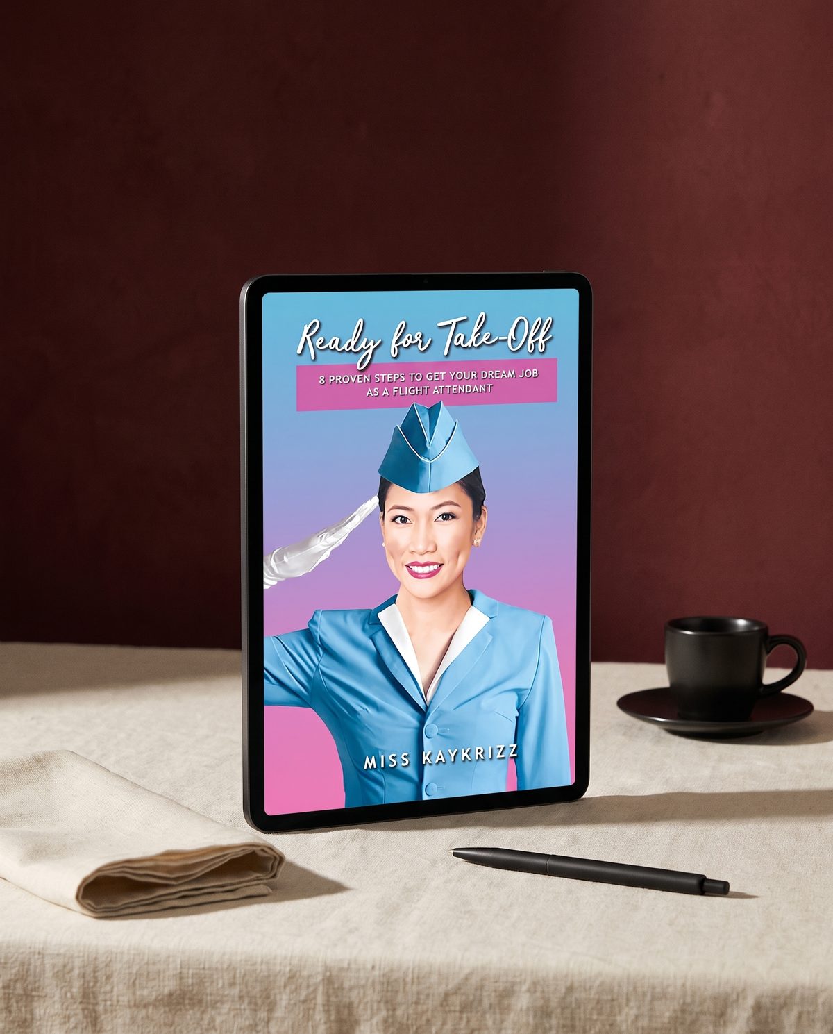 Ready for Take-Off ebook displayed on a tablet beside coffee and a notebook
